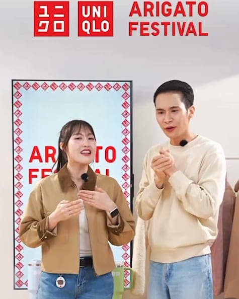 Two hosts on the Uniqlo Arigato Festival live set